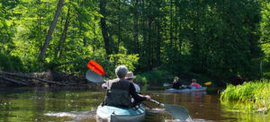 Florida eco-camping adventure. Enjoying ecotourism while kayaking.